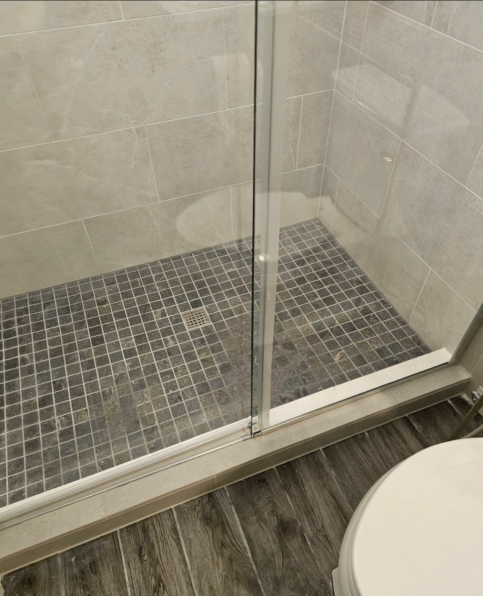 Modern shower base with elegant floor tiling