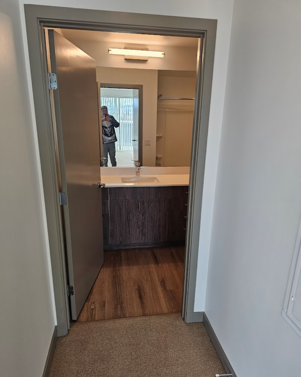 Bathroom view showcasing a sleek and functional vanity