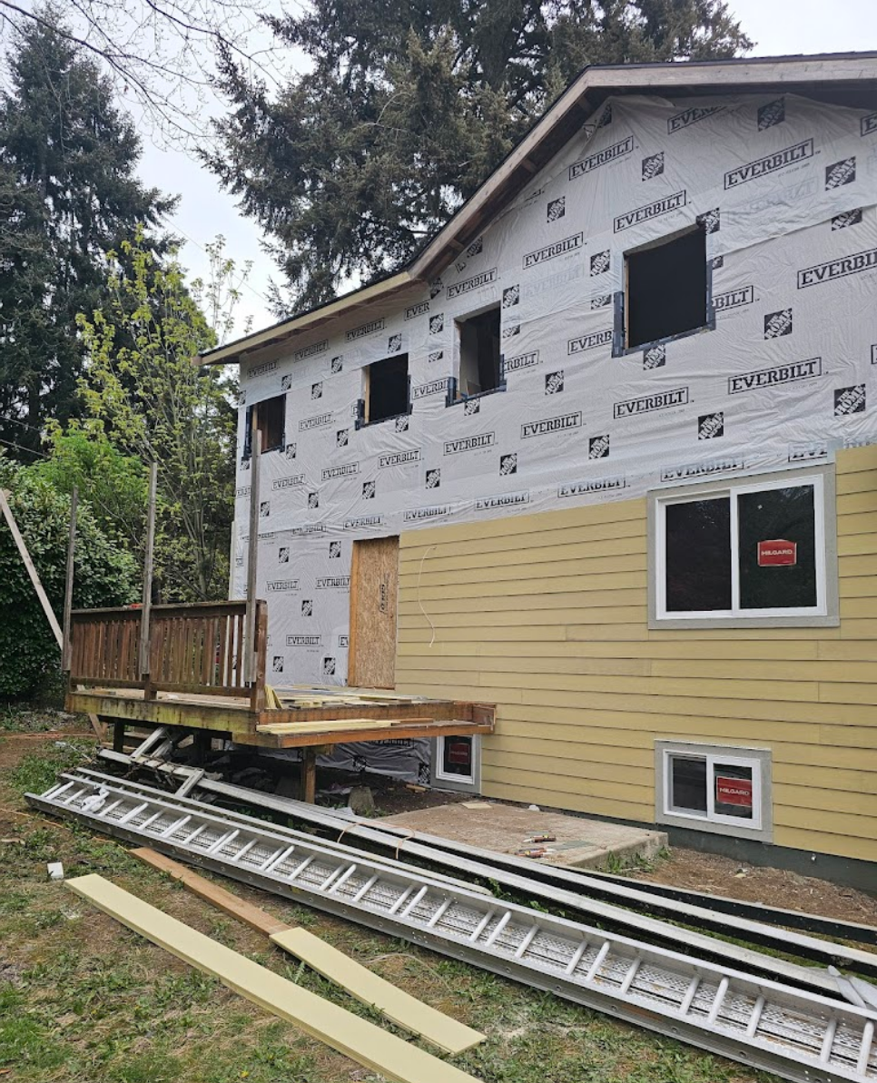 Home under renovation with partial siding installed