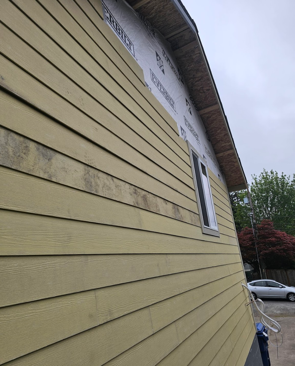 Close-up of siding installation process