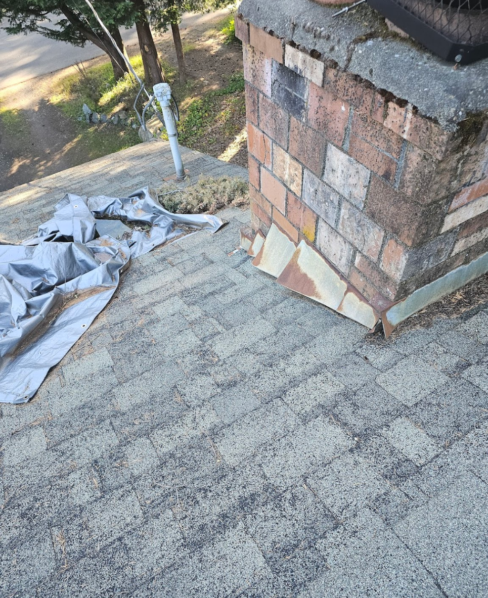 Close-up of chimney repair during rooftop renovation