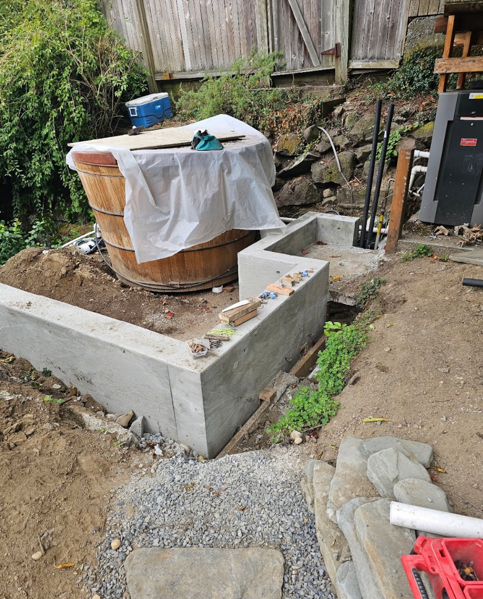 Construction of a concrete patio foundation in progress