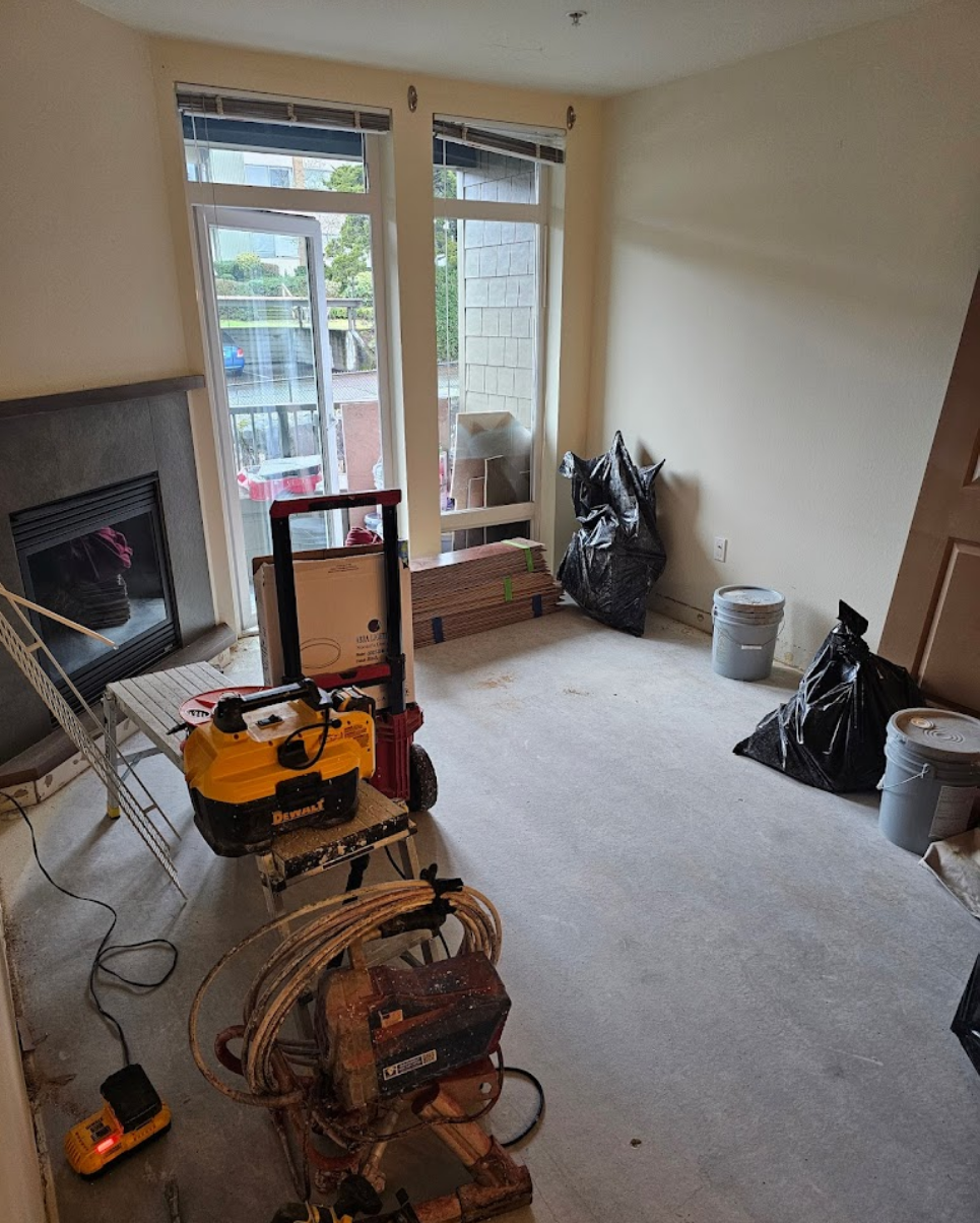 Flooring installation in progress with tools and materials ready