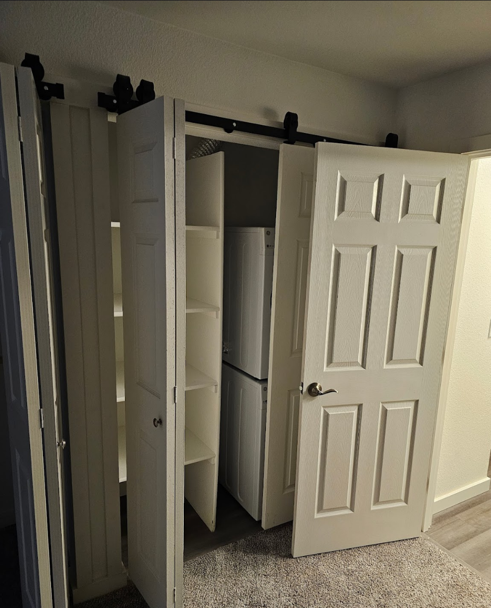 Room addition showcasing clean and functional closet design.