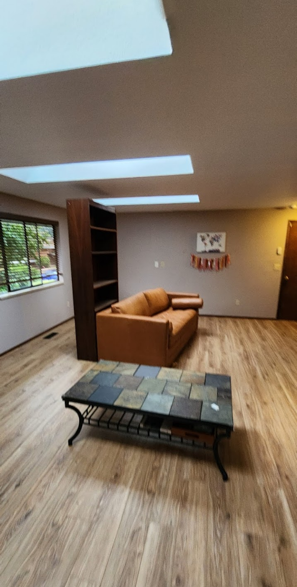 Renovated hallway with seamless flooring