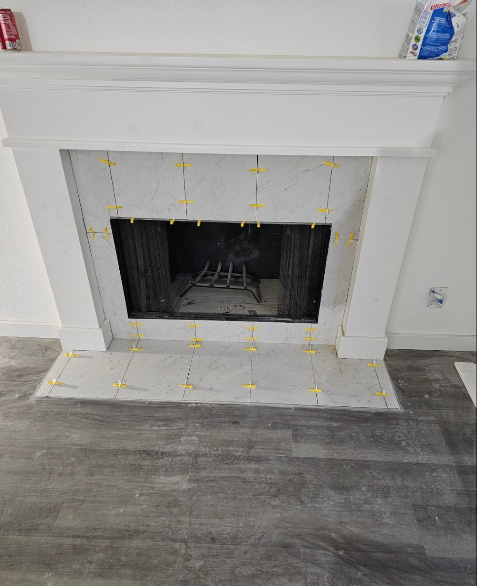 Refurbished fireplace with a clean and modern look