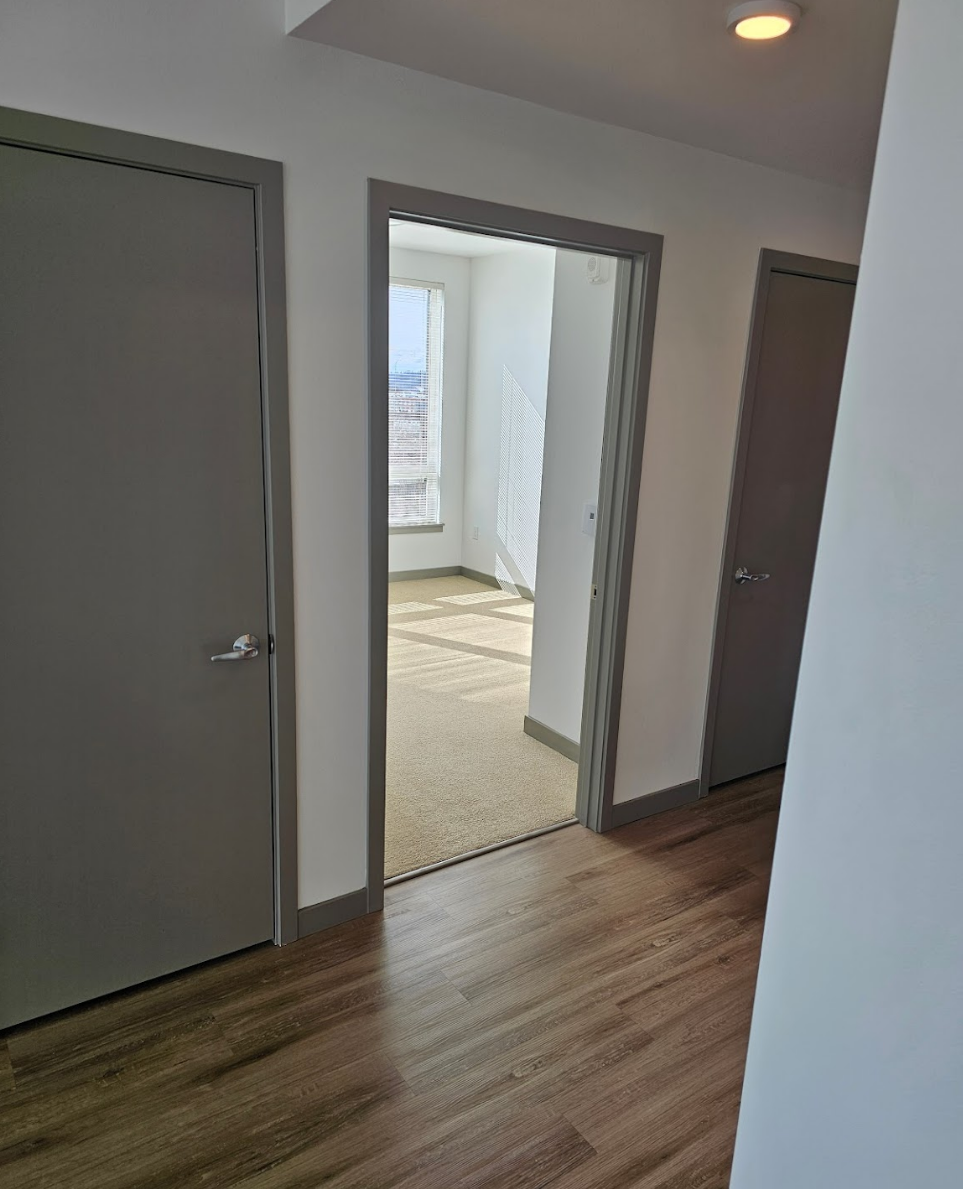 Renovated hallway with seamless flooring