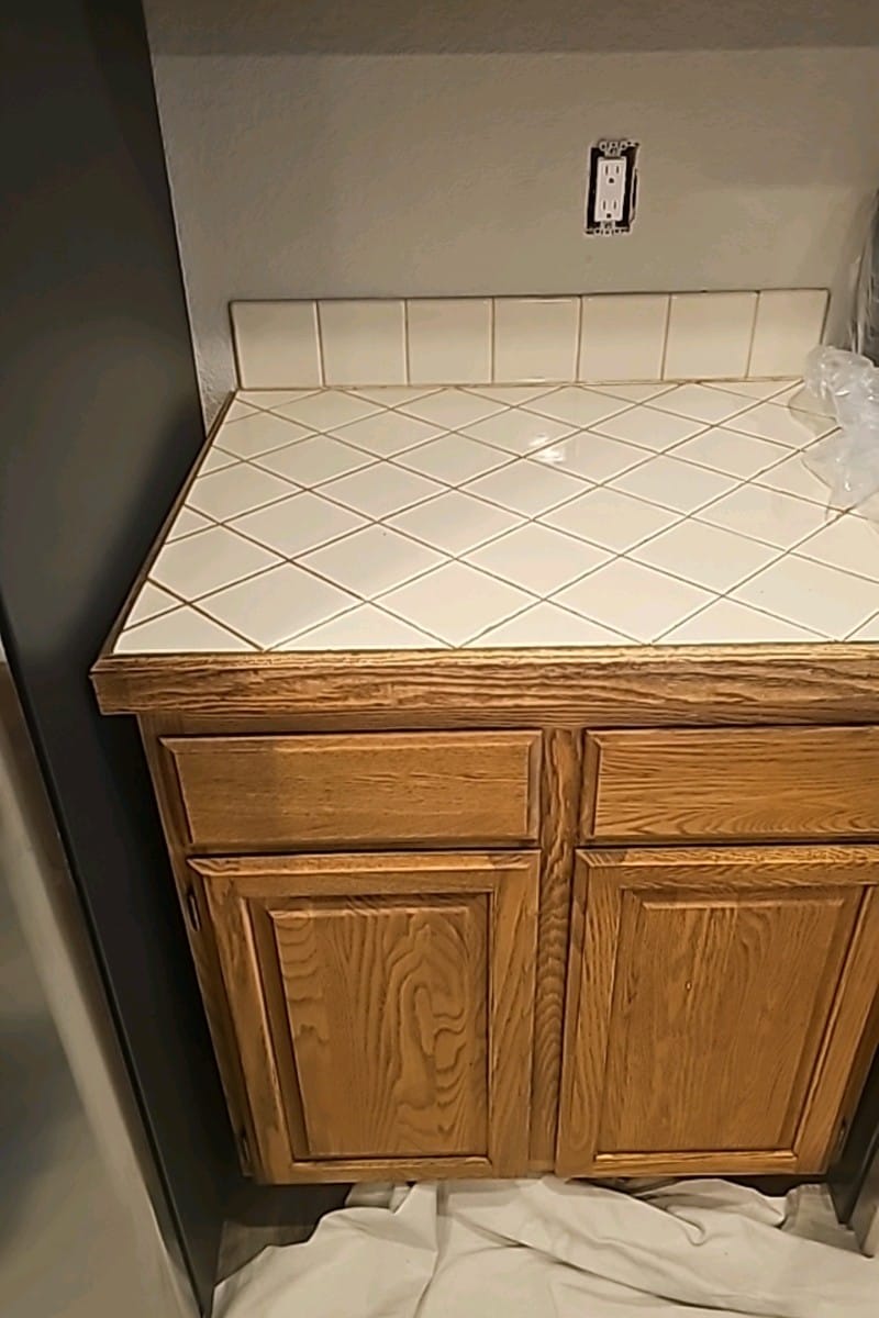 Detail of tile installation in kitchen renovation