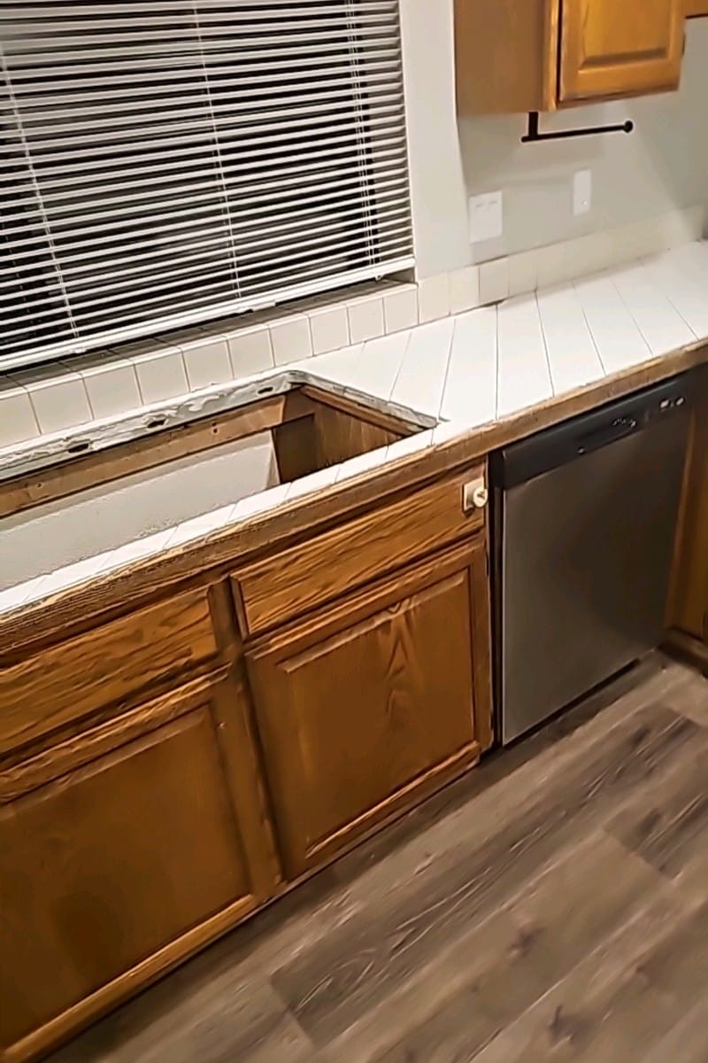 Renovated kitchen sink and countertop area