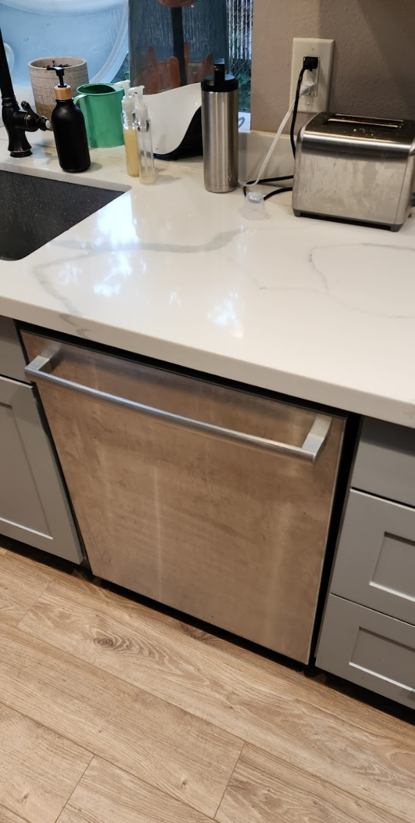 Close-up of stainless steel appliances and clean finishes