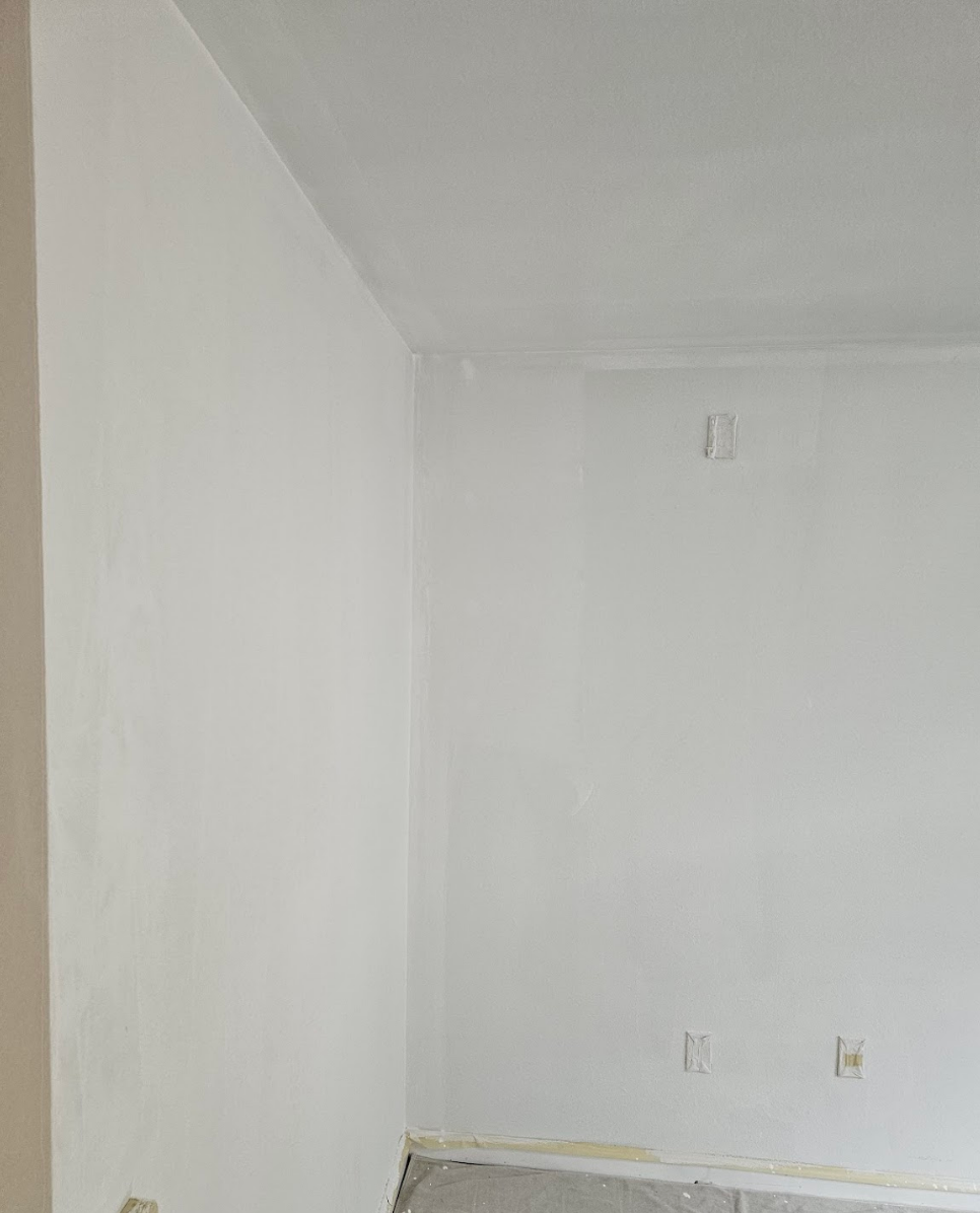 Walls prepared and coated with primer, ready for final painting