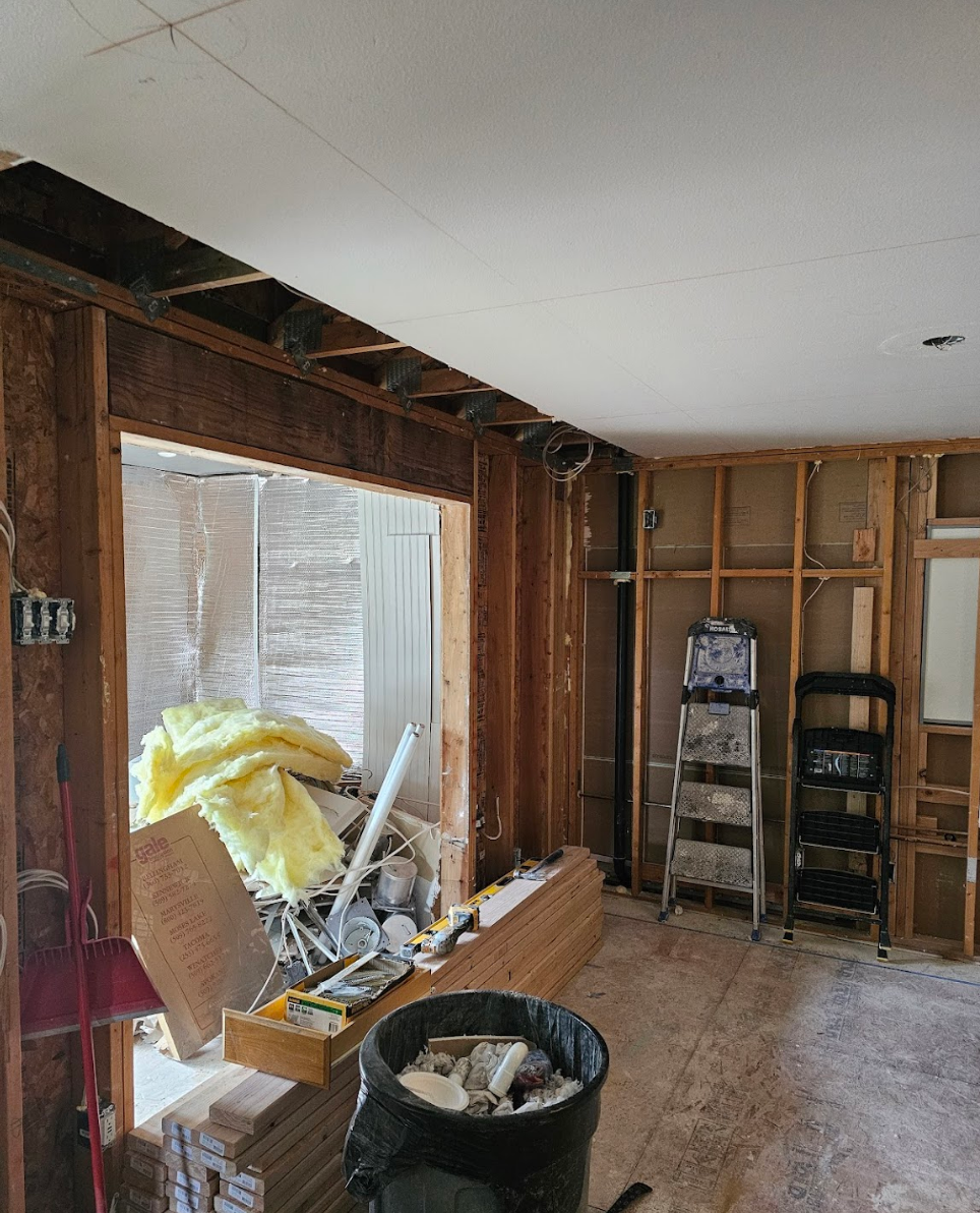 Living room restoration with exposed beams